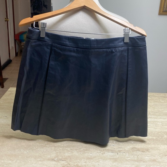 Dresses & Skirts - NWT Vince Camuto Genuine Leather Navy Mini Skirt, measurements in photos below.